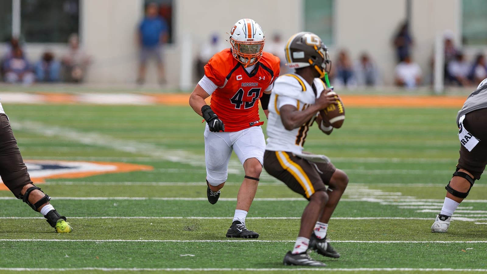 Snow College player Jaden Manwaring pursues a ball carrier in an official Badgers athletics photograph.
