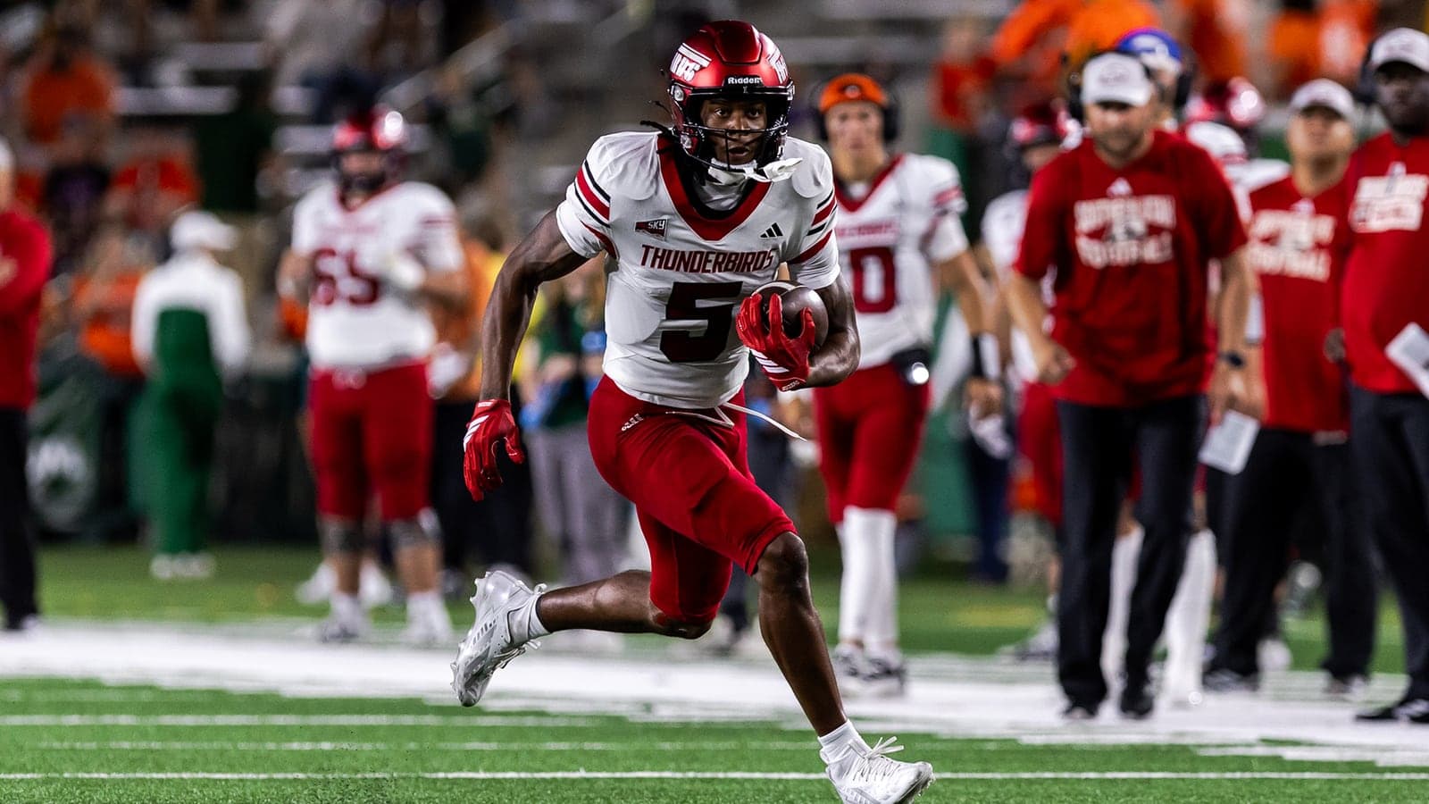 Southern Utah receiver Mark Bails runs with the football in an official Thunderbirds Athletics photograph released with the Colorado State recap.