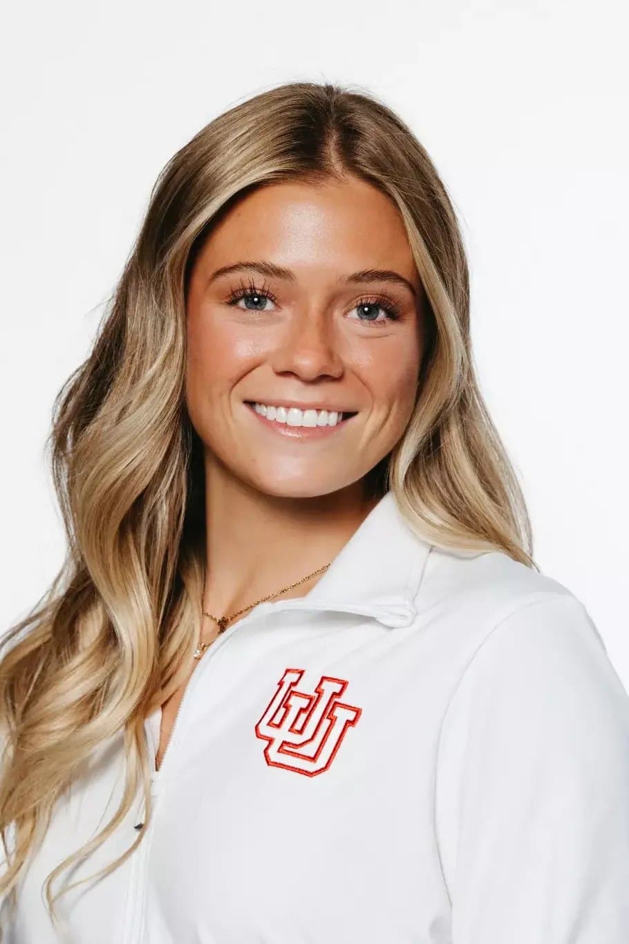 Official University of Utah roster headshot of gymnast Avery Neff in a white Utah jacket.