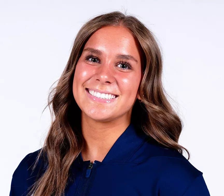Official Utah State roster headshot of gymnast Lundyn VanderToolen in a navy Utah State jacket.