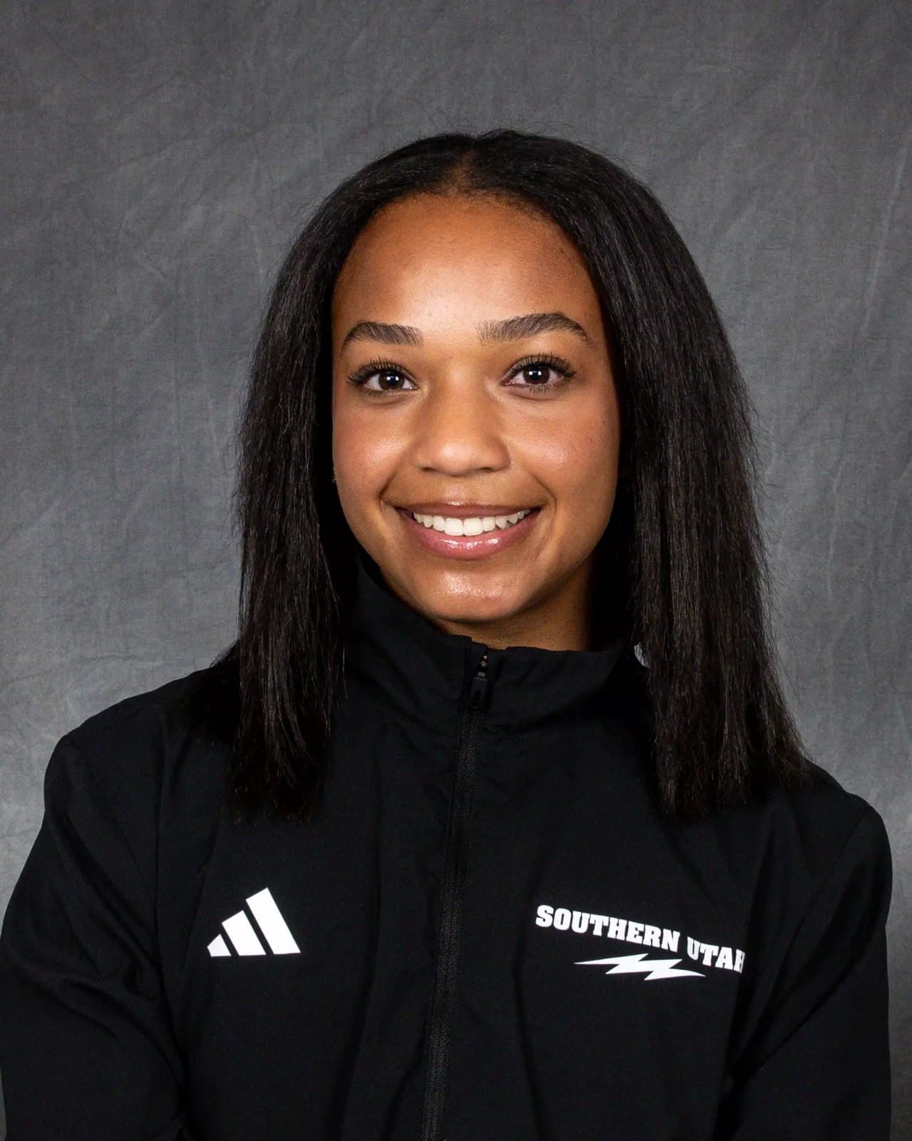 Official Southern Utah roster headshot of gymnast Niya Randolph in a black Southern Utah jacket.