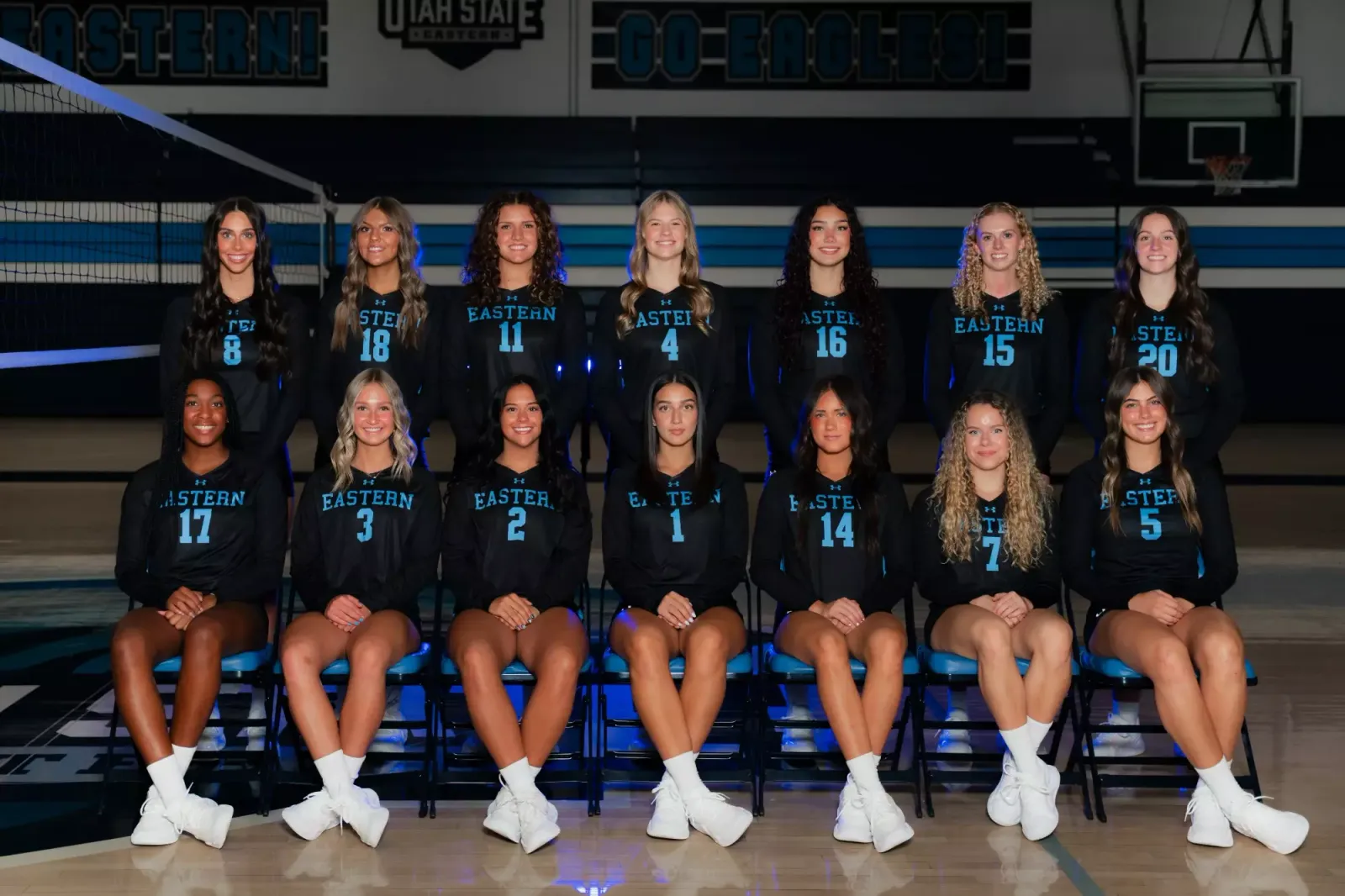 USU Eastern volleyball players pose on court in the official 2026-27 team photo.